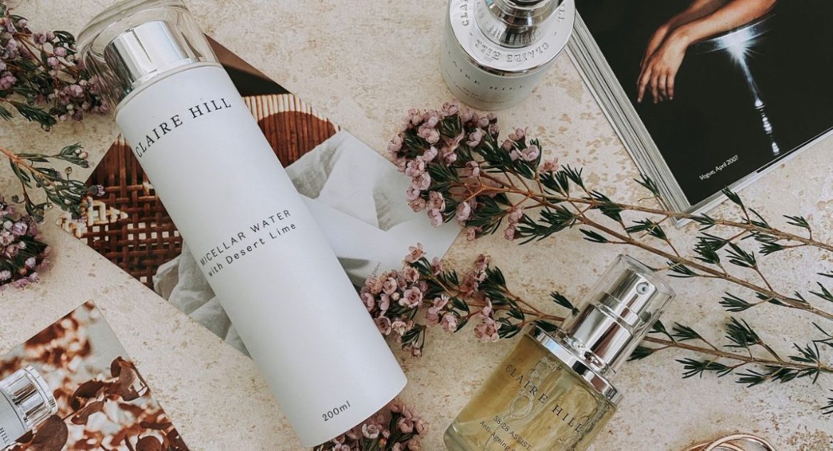 Clair Hill product flatlay with flowers