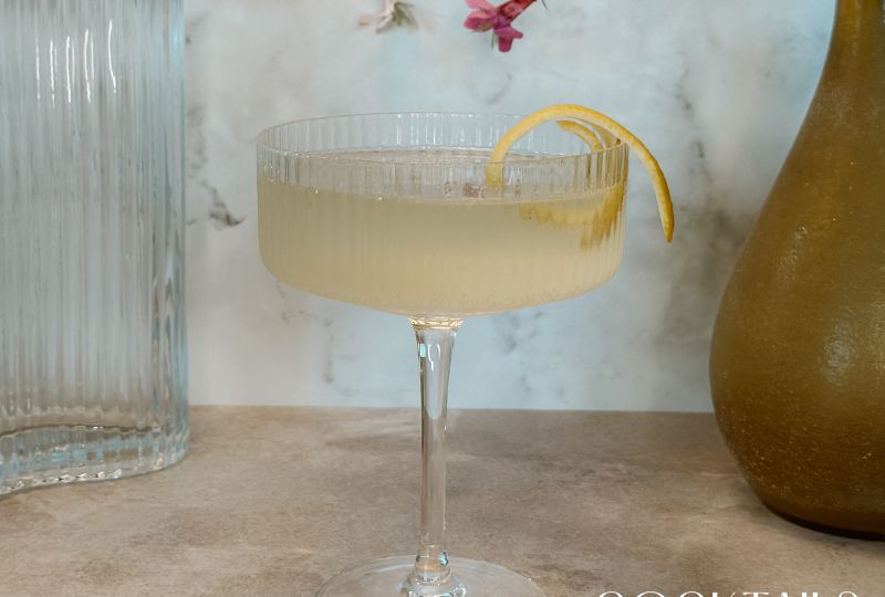 French75 cocktail served in coupe glass